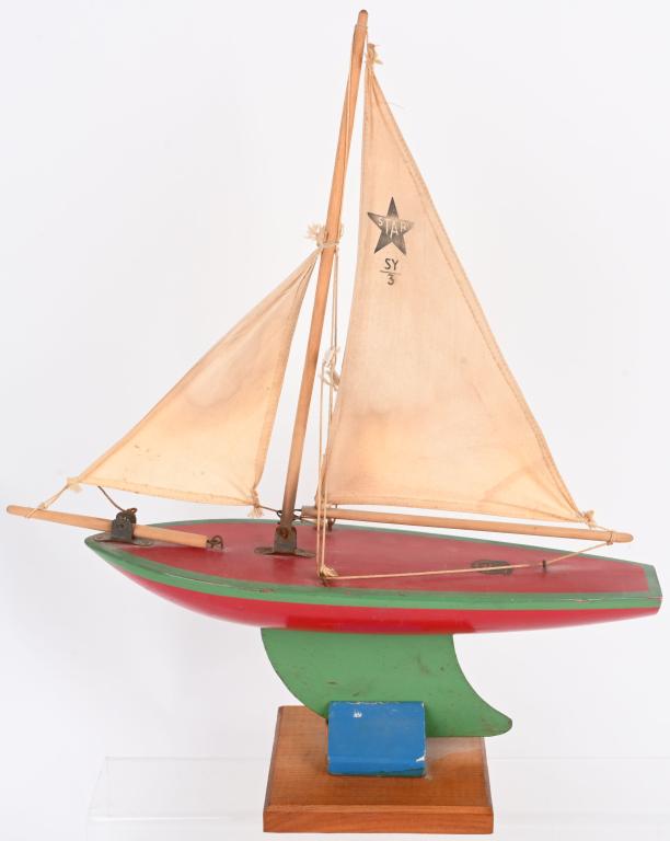 VINTAGE STAR YACHT SAIL BOAT MADE IN ENGLAND: Great looking vintage Sail Boat with stand made by Birkenhead in England. 19"H, by 16" L. Very Good-Excellent