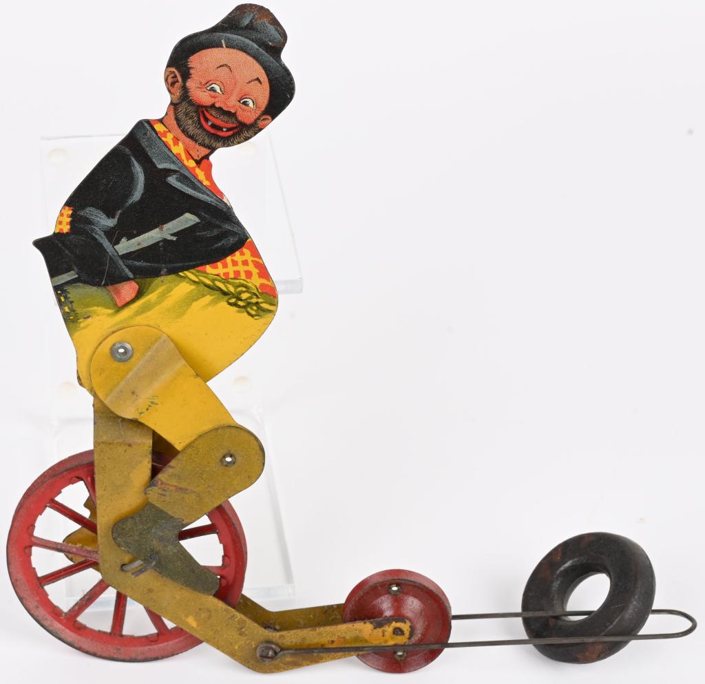 VINTAGE MECHANICAL TIN HOBO ON UNICYCLE (1 of 2)