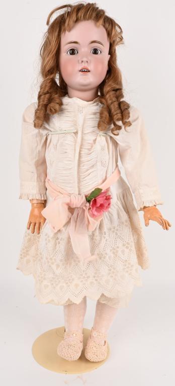 LARGE GERMAN BISQUE KESTNER 171 DOLL, 33": Impressive large 33" doll made by Kestner. Marked on socket head Made in Germany 171, 16 1/2. The doll has big brown sleep eyes and open mouth. Wig is correct replacements. The doll is nicely dressed