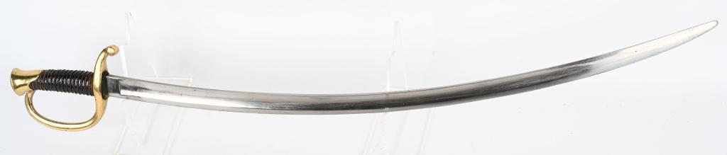 CIVIL WAR ENLISTED LIGHT ARTILLERY SWORD 1862: Civil War Model 1840 Light Artillery Sword. 31 ¼-inch blade marked "US / L.D / 1862." markings are very faint on the obverse ricasso. Brass hilt. Wire-wrapped leather grip. Blade with an overall brig