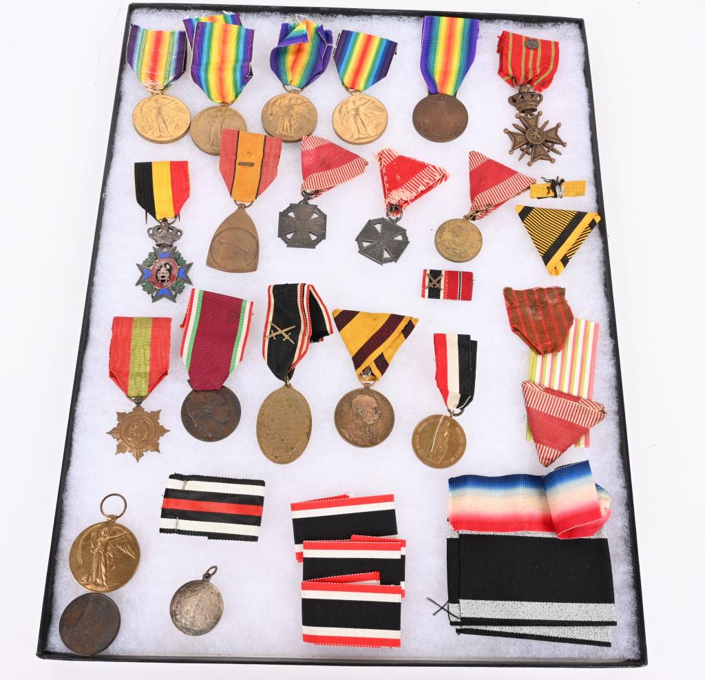 WW1 BRITISH FRENCH GERMAN BELGIUM MEDAL LOT OF 19: Large lot of mostly WWI medals from Germany, France, Britain and Belgium. Medals in Victory medals, Croix de Guerre, Order of Leopold II, Austria Hungary Kaiser Karl Cross, 1914-1918 Commemorative War