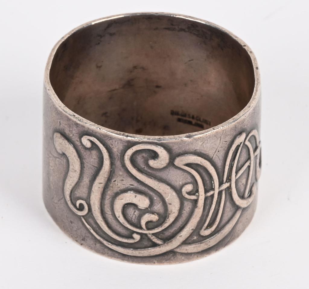 SILVER 1920 NAMED US MILITARY ACADEMY NAPKIN RING: Vintage sterling silver United States Military Academy at West Point napkin ring. Decorated with Art Nouveau like letters USMA. Engraved inscription Kurt Browne Schilling Class of 1920 at the inside o
