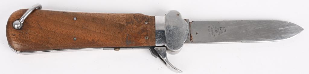 WWII NAZI GERMAN PARATROOPER GRAVITY KNIFE BY SMF: WWII German Fallschirmjager gravity knife, maker marked SMF Solingen. The spring has been replaced as seen in the photos. Blade is in very good condition with one small nick. Mechanically very good. O