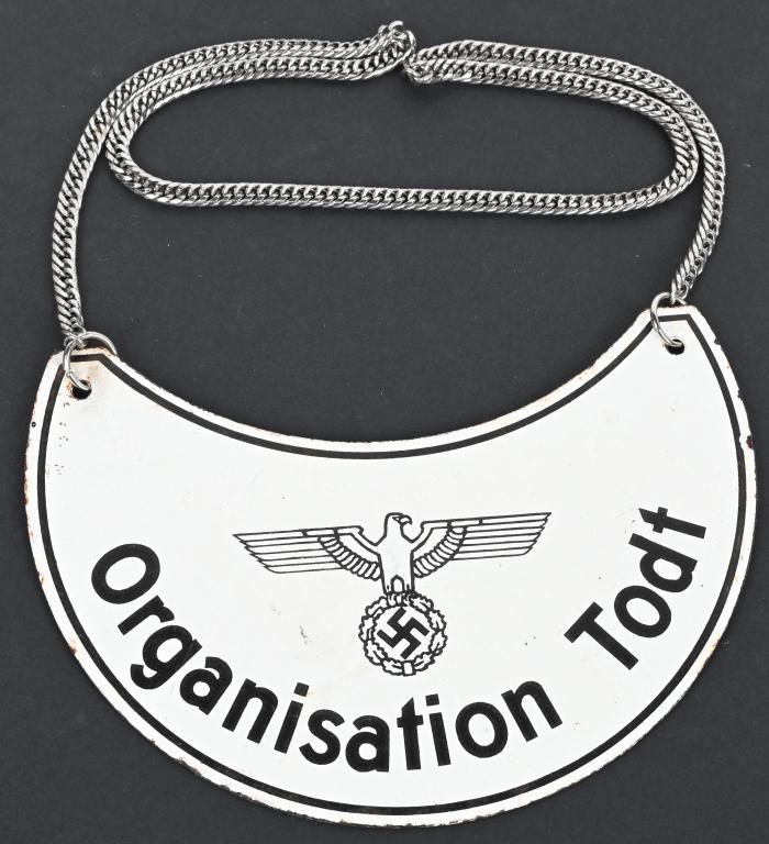 WWII THIRD REICH ORGANISATION TODT GORGET WW2: Metal, White enamel background w/ Black enamel logo and lettering, "Eagle w/Swastika with a wreath", Reads "Organisation Todt", Some chips on edges, Very little if any scratches on front. Chain is pre