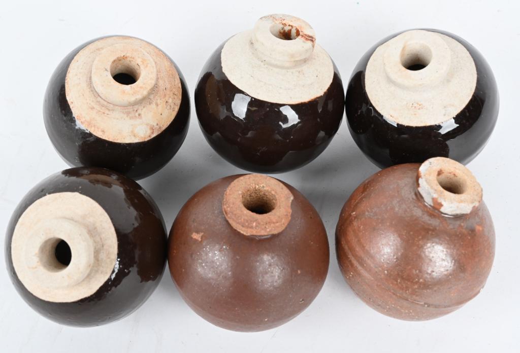 LOT OF 6 TYPE 4 JAPANESE HAND GRENADE LOT WW2: Lot of six Type 4 Japanese ceramic hand grenades with two having minor chips to the throat of the grenade. Excellent History and development By late 1944 and early 1945, much of the industrial infrast