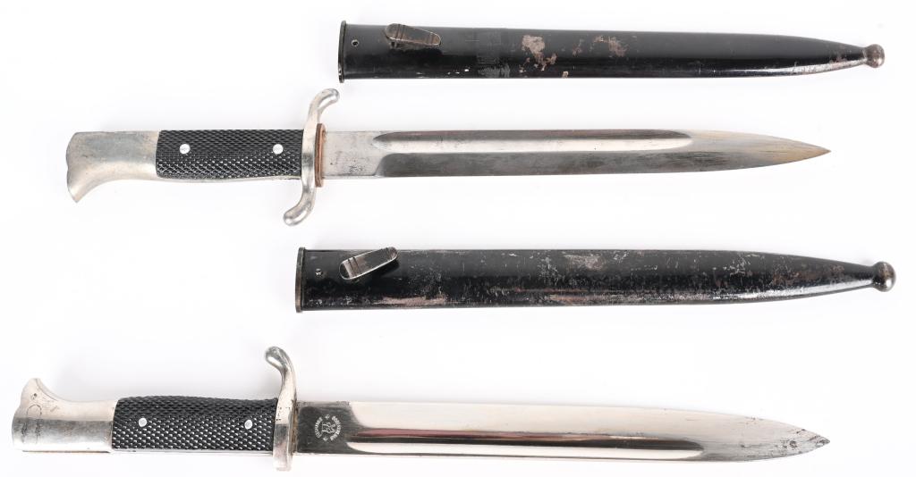 WWII NAZI GERMAN DRESS BAYONET LOT OF 2 WW2: WWII Nazi German Dress Bayonet lot of two. 1) Roughly, 25cm long, nickel/silver plated, drop forged, steel construction blade with deep, fullers to each side and a top edge swedge to the forward tip. 
