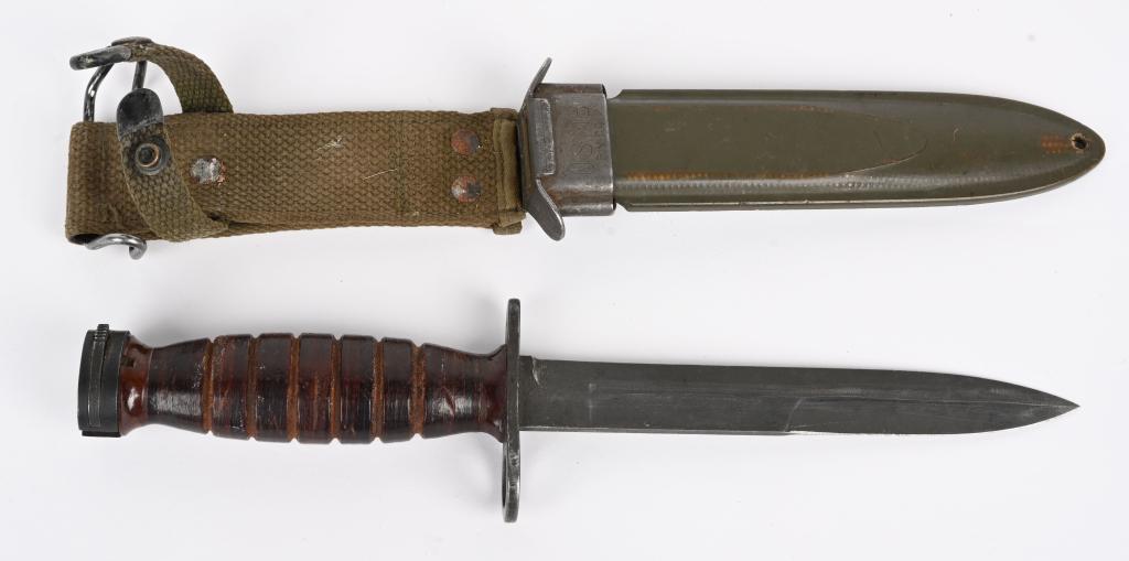 WWII US M4 BAYONET FOR M1 CARBINE W/ M8 SCABBARD: Guard marked PAL and US M4 with "S" proof on the pommel. Light age wear to the scabbard particularly at the rivets and retention strap. Excellent.