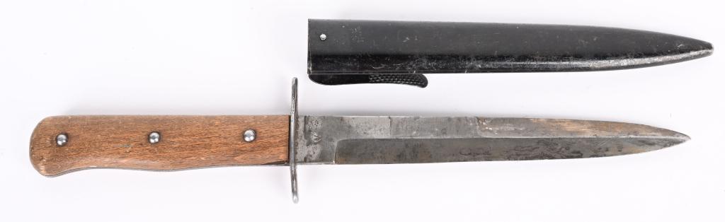 WWII NAZI GERMAN CLOSE COMBAT TRENCH BOOT KNIFE: The knife features a roughly, 15cm long, drop forged steel construction, non-fullered, blade with a long top swedge and a full length, including the hilt, of roughly, 27cm marked W. The knife has a na