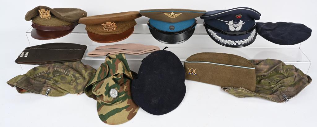 MILITARY HEADGEAR LOT US GERMAN RUSSIAN WWII COLD: Military headgear lot to include 1) West German Luftwaffe Visor Hat size 60 and dated 1991. 2) WWII US Army Officer Visor Hat heavily worn with moth damage 3) Soviet Union 1991 dated visor hat 4) WWII
