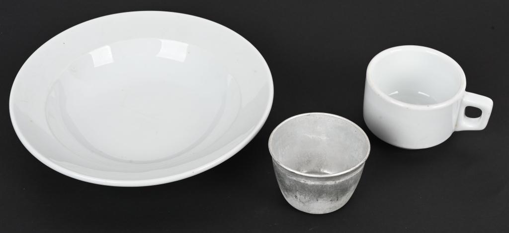 WWII NAZI GERMAN MESS HALL ITEMS SS REICH MARKED: WWII Mess hall items to include 1) Coffee Cup marked SS REICH 1936 by Bauscher Weiden on the bottom. 2) Fire glazed white stoneware salad plate marked to the bottom Bauscher Weiden with the cogged whe