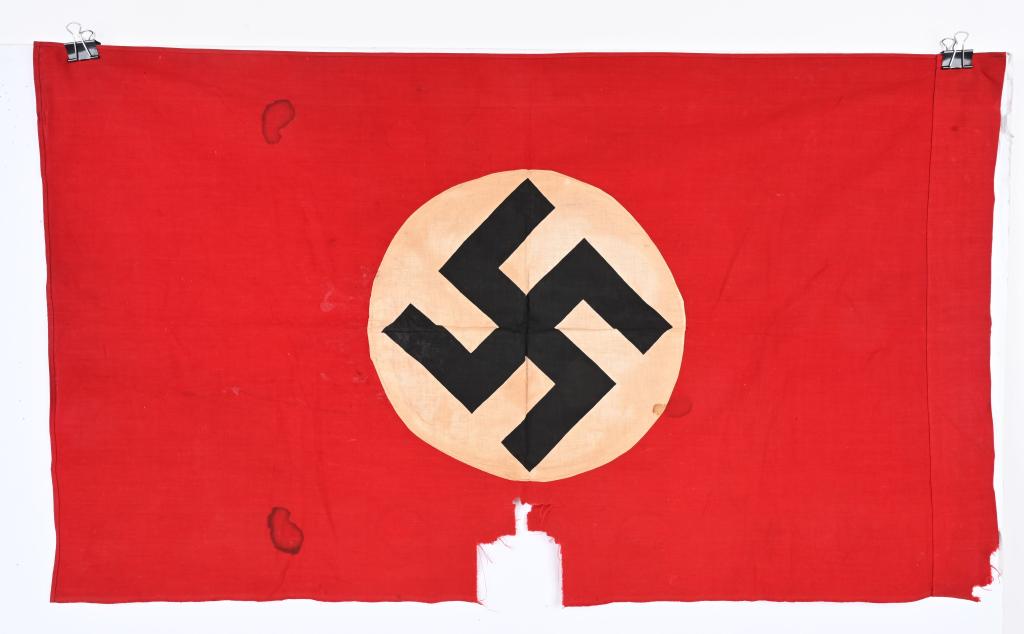 WWII NAZI GERMAN NSDAP WALL BANNER FLAG WW2: Multi-piece cotton construction banner approximately 23 x 41 inches. To both its red fields are sewn white disks, with a printed mobile swastikas in black. Good with tears and missing fabric Probably 