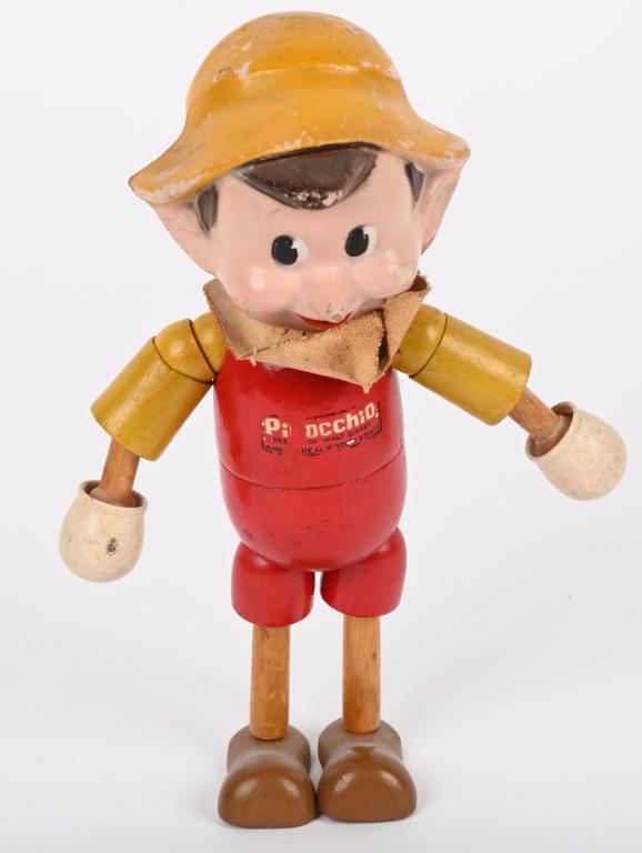 IDEAL PINOCCHIO WOOD JOINTED FIGURE: All original Ideal Pinocchio wood jointed figure. Nice paint with decent decal. 7 1/2" Very Good-Excellent From the James and Helen Berkheimer Collection