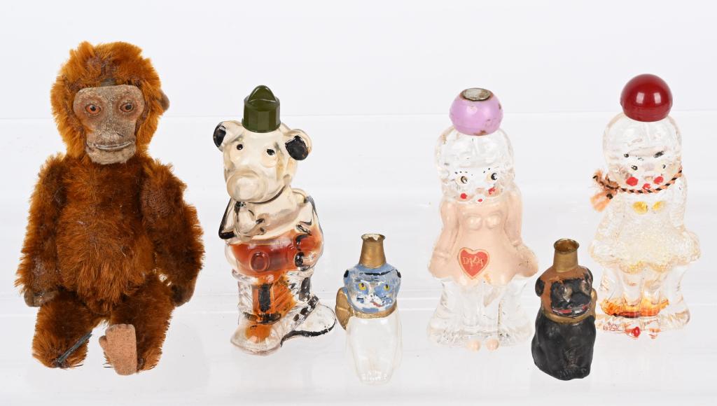 SCHUCO MONKEY & OTHER FUGURAL PERFUMES: Includes Schuco Monkey, Betty Boop, Mickey Mouse, and more. Largest 4 3/4" Very Good-Excellent From the James and Helen Berkheimer Collection