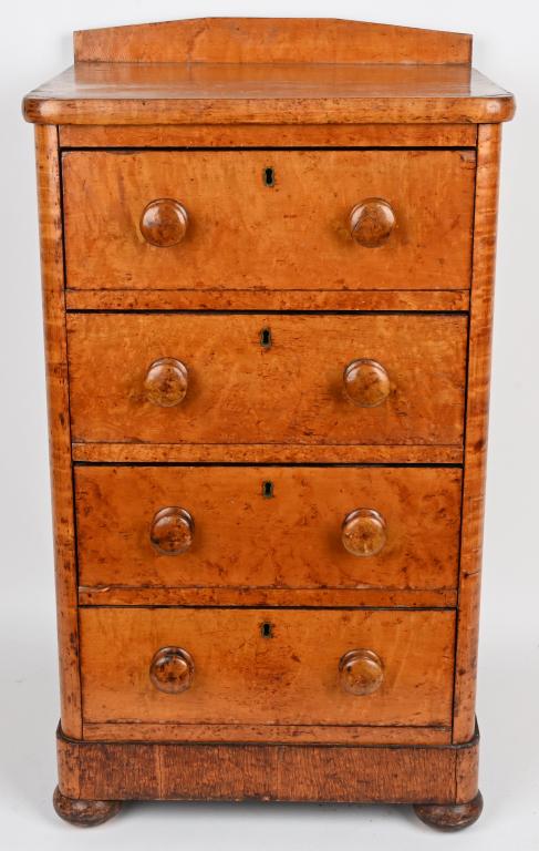 ANTIQUE BIRDSEYE MAPLE FOUR DRAWER STAND: Early Birdseye maple 4 drawer stand. The drawers are dovetailed and each has a lock. The stand has wear and some cracking. Measures 31" H, 18" W, 15" D. Very unusual piece that displays well. Good-Ver
