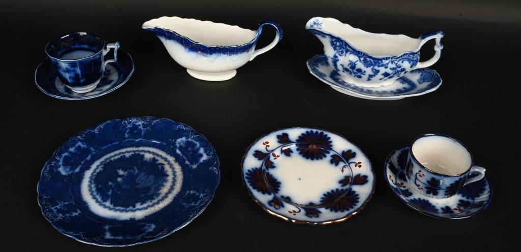 9- ANTIQUE FLOW BLUE CHINA: Nice grouping with cups and saucers, gravy boats and more. Different patterns. Some condition issues. Largest is 8", AS-IS