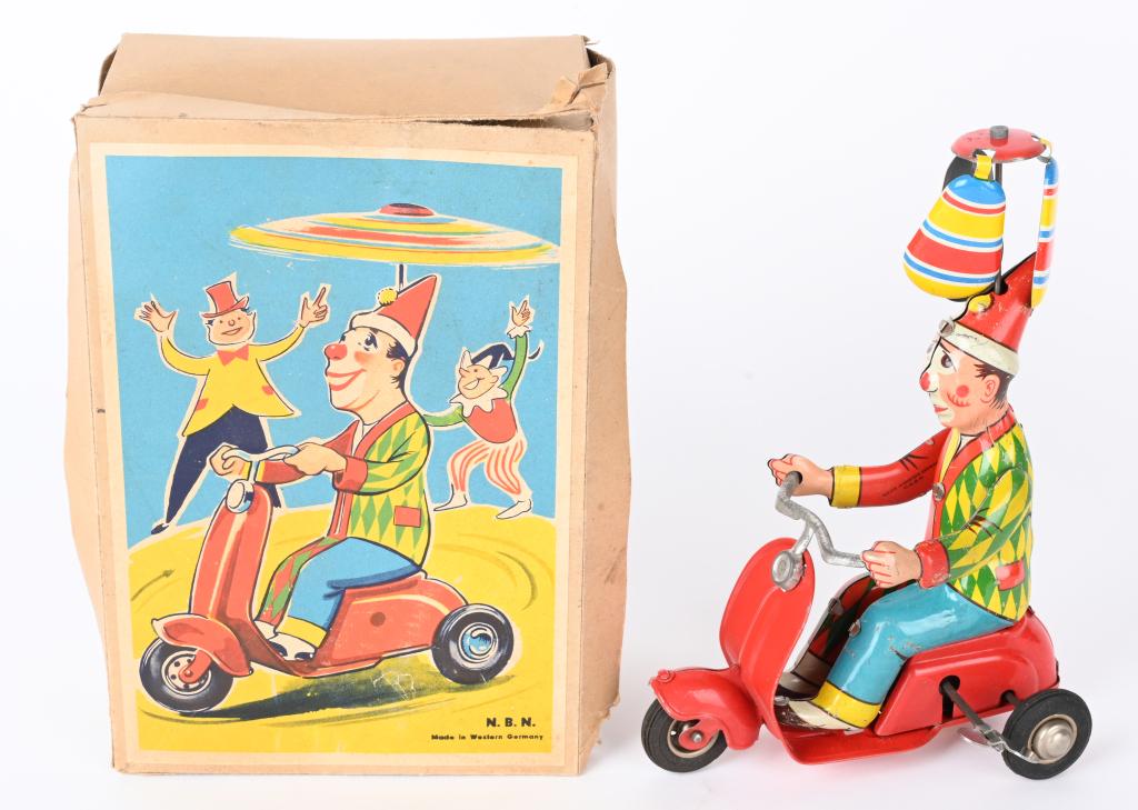 W GERMANY TIN WINDUP CLOWN ON SCOOTER w/ BOX (1 of 8)