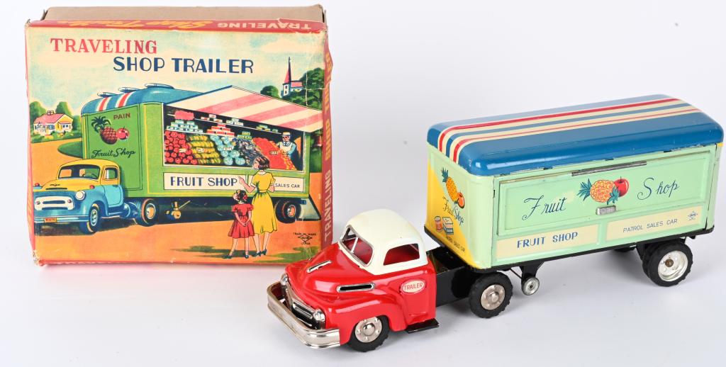 JAPAN FRICTION TRAVELING FRUIT SHOP TRAILER w/BOX: Japan tin friction Traveling Fruit Shop Trailer. All original with great colors and details. Trailer sides open to show the fruit. Has semi truck front end. Friction works. With Box. 12" Excellent