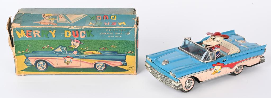 JAPAN TIN FRICTION MERRY DUCK CAR w/ BOX: Japan tin friction Merry Duck Car. All original and complete. Friction works and Duck still quacks. With Box. 8" Excellent