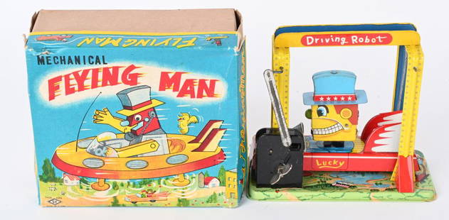 JAPAN TIN WINDUP FLYING MAN ROBOT w/ BOX: Japan tin windup Flying Man Robot. All original with nice colors. Windup works. Missing flag. With Box. 6 1/2" Excellent