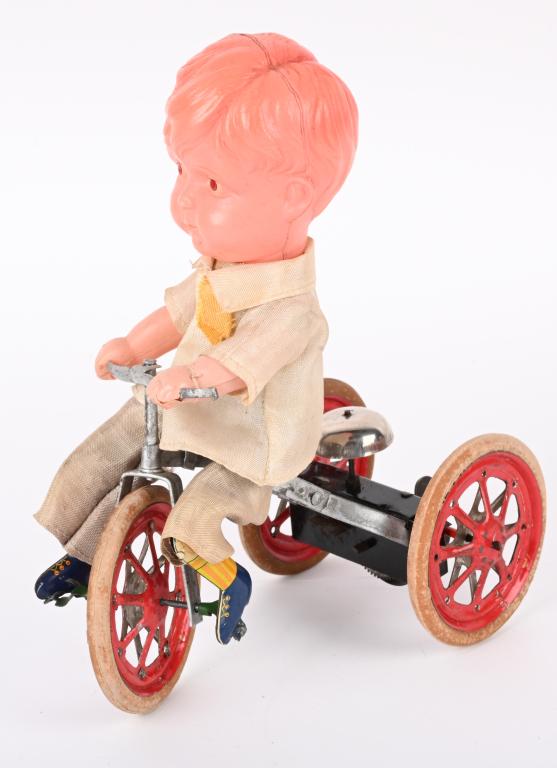 JAPAN WINDUP TIN & CELLULOID TRICYCLE RIDER (1 of 4)