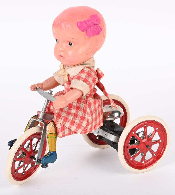 JAPAN WINDUP TIN & CELLULOID TRICYCLE RIDER (1 of 5)