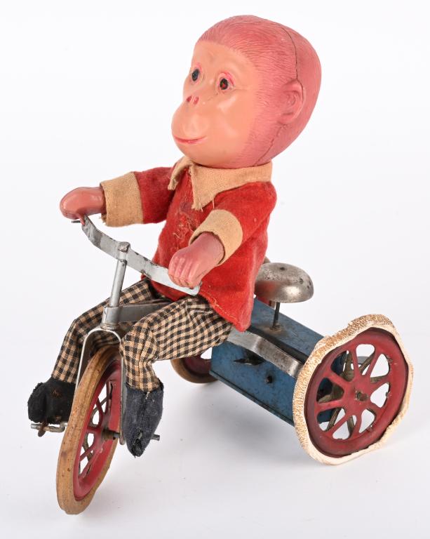 JAPAN WINDUP TIN & CELLULOID TRICYCLE RIDER (1 of 4)