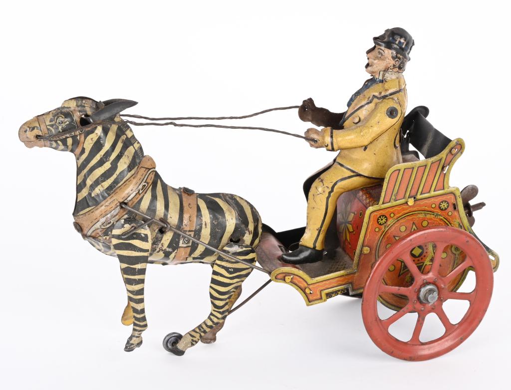 GERMAN TIN WINDUP GENTLEMAN IN ZEBRA CART (1 of 4)
