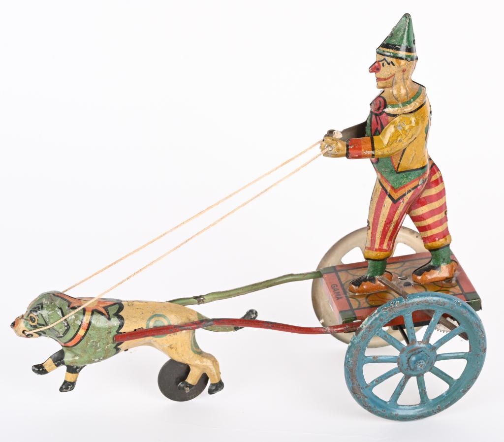 GAMA TIN WINDUP CLOWN PULLED BY DOG (1 of 4)