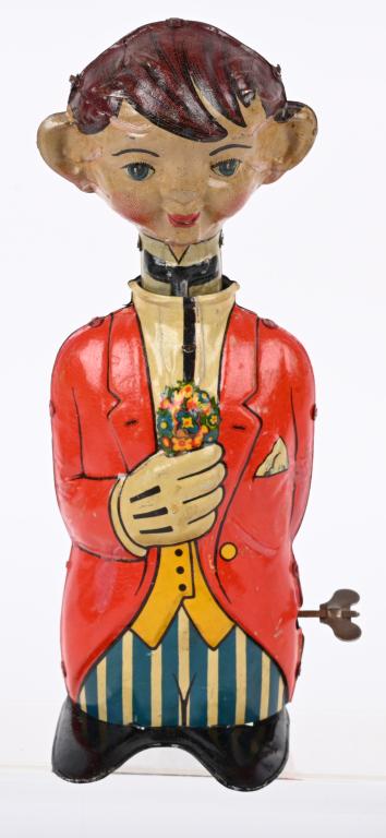 GERMAN TIN WINDUP BOY WITH FLOWERS (1 of 4)