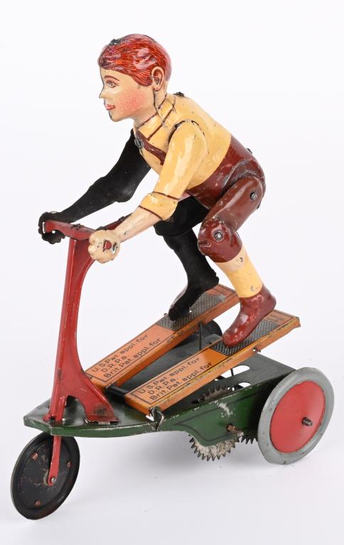 STOCK TIN WINDUP BOY ON SCOOTER (1 of 5)