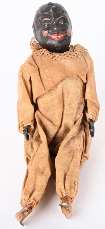 GERMAN TIN WINDUP SEATED BLACK CLOWN (1 of 6)