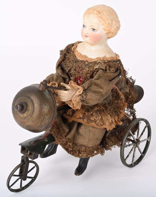 GERMAN CLOCKWORK GIRL RIDING TRICYCLE BELL TOY (1 of 7)