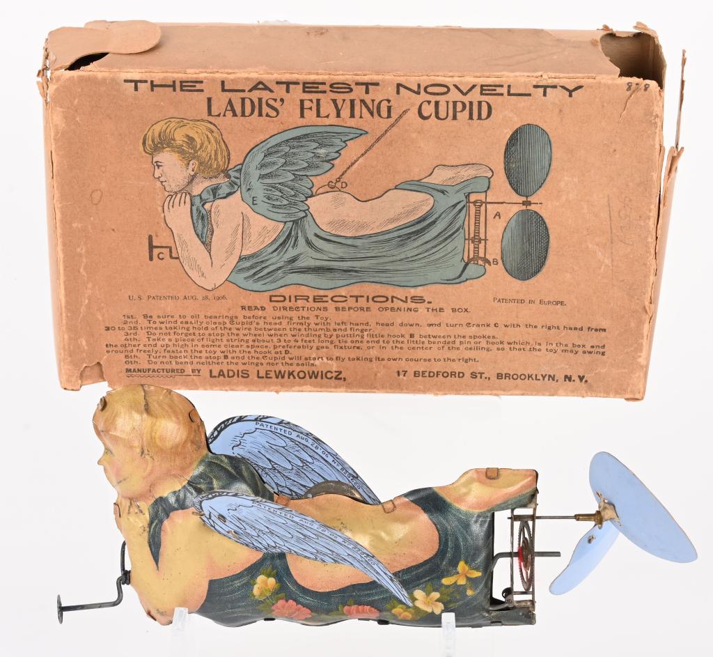 LADIS TIN WINDUP FLYING CUPID w/ BOX (1 of 6)