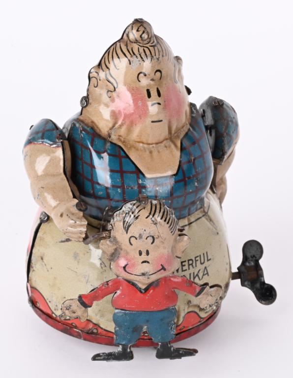 NIFTY TIN WINDUP POWERFUL KATRINKA & JIMMY (1 of 4)