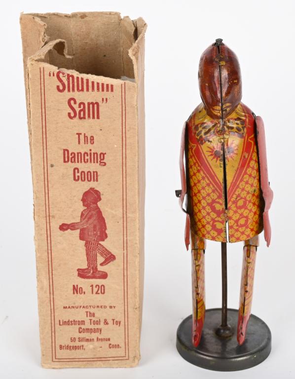 LINDSTROM WINDUP SHUFFLIN SAM DANCING COON w/BOX: Lindstrom tin windup Shufflin Sam The Dancing Coon. All original and complete. Windup works. With Box. 7 1/2" Excellent