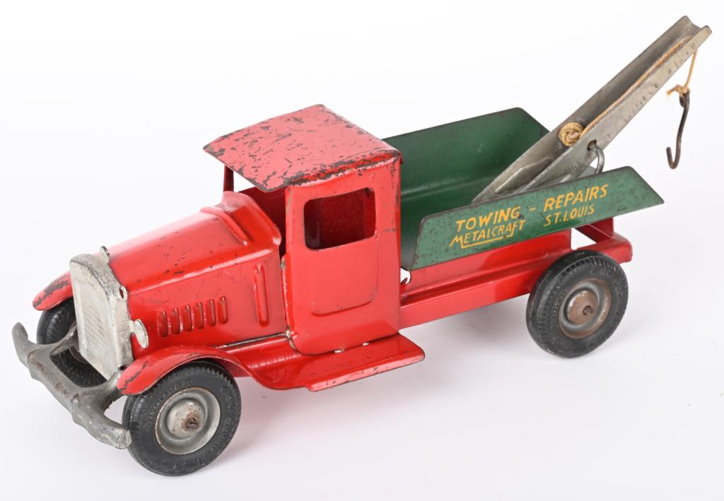 METALCRAFT TOWNG & REPAIRS WRECKER TRUCK: All original Red & Green Metalcraft Towing & Repairs, St. Louis wrecker truck. Deluxe version with front bumper and rubber tires. 12", Very Good