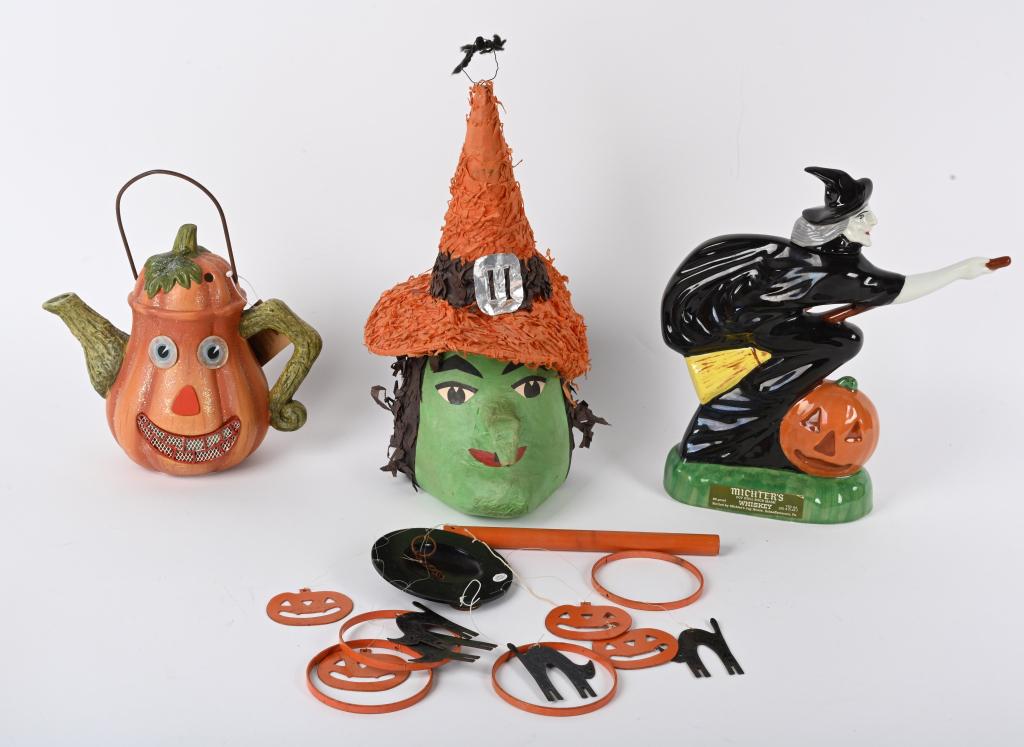 LOT OF HALLOWEEN ITEMS: Includes Michter's Whiskey Witch Bottle, Witch Pinata, and Jack-O-Lantern tea lighted holder Also comes with Halloween wind chimes. Largest 13" Excellent