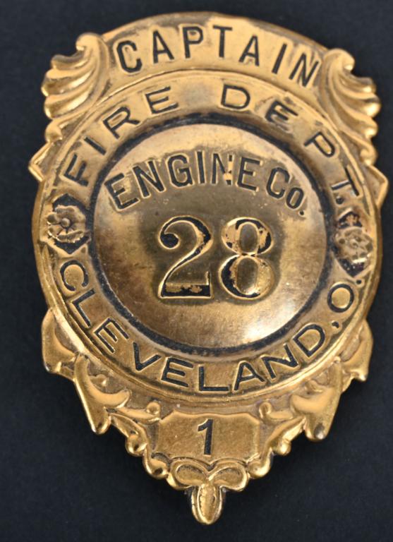 CAPTAIN CLEVELAND FIRE DEPT. BADGE (1 of 2)