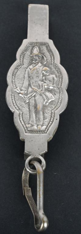 EARLY FIREMAN PARADE BELT SLIDE & HELMET CLIP (1 of 2)