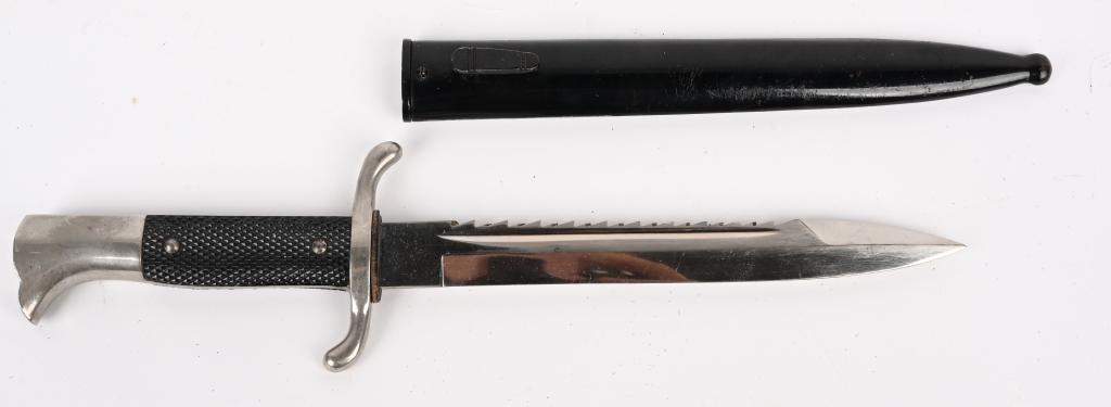 WWII NAZI GERMAN FIRE POLICE SAWTOOTH BAYONET WW2: Drop forged 7 3/4" long, bright nickel/silver plated steel blade with wide fuller to each side. Blade is in overall very good condition and is the sawtooth variety. Maker marker to Eickhorn. Brown lea