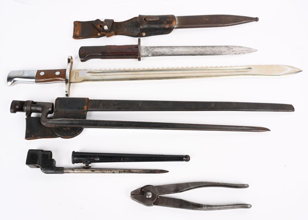 WWII US POLISH BRITISH SWISS KNIFE LOT WW2: Military fighting knife lot that includes; 1) Polish Radom bayonet with a German K98 scabbard and leather frog in good condition. 2) .45-70 Trap Door Bayonet with scabbard and leather scabbard..&