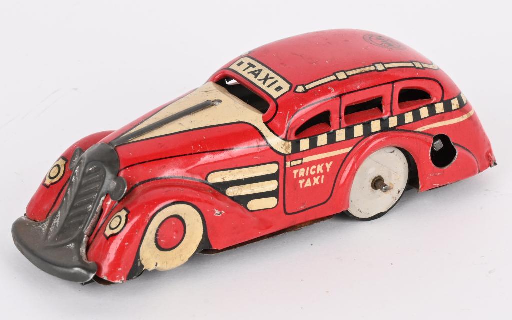 MARX TIN WINDUP TRICKY TAXI (1 of 3)
