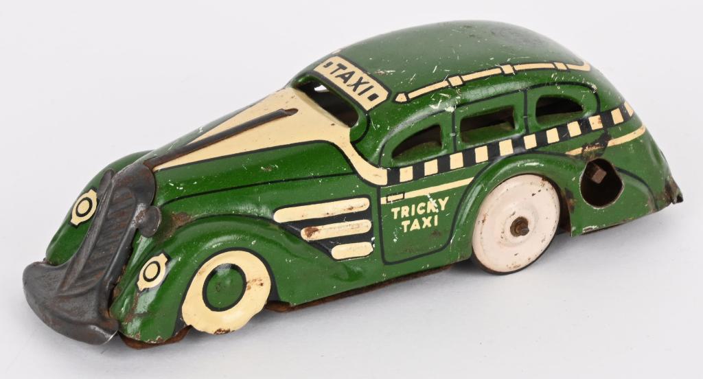 MARX TIN WINDUP TRICKY TAXI (1 of 3)