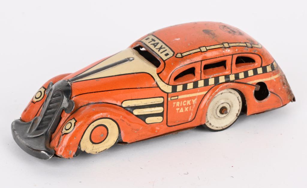 MARX TIN WINDUP TRICKY TAXI (1 of 3)