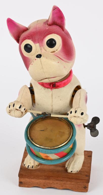 PRE-WAR JAPAN CELLULOID FRENCH BULLDOG DRUMMER: Pre-War Japan cellulopid windup French Bulldog Drummer. All original and complete. Has great colors. Windup works. 9" Excellent