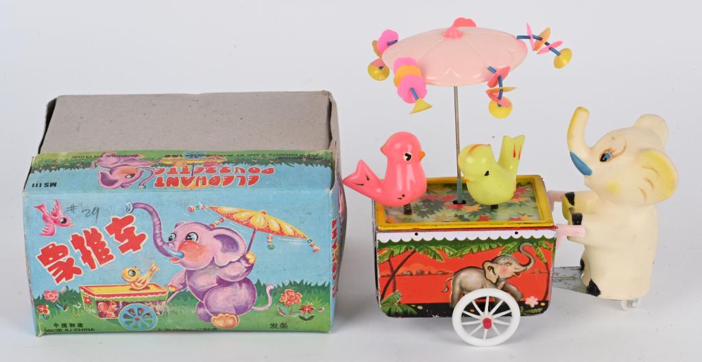 RED CHINA WINDUP ELEPHANT WHIRLY GIG w/ BOX: Red China windup Elephant Whirly Gig. All original and works. Boxed 7" Excellent
