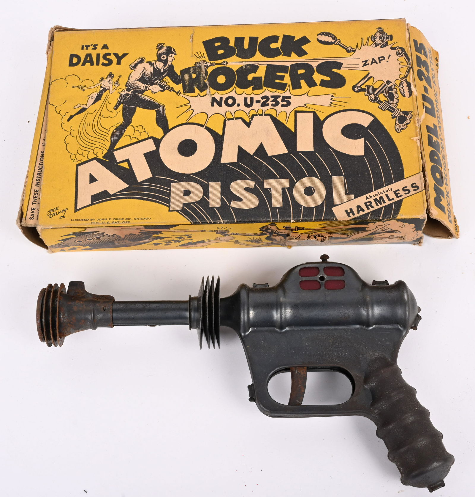 DAISY BUCK ROGERS ATOMIC PISTOL w/ BOX: Daisy Buck Rogers Atomic Space Pistol. All original and working. Has some light corrosion. May clean to a higher grade. Comes with Box 10" Very Good