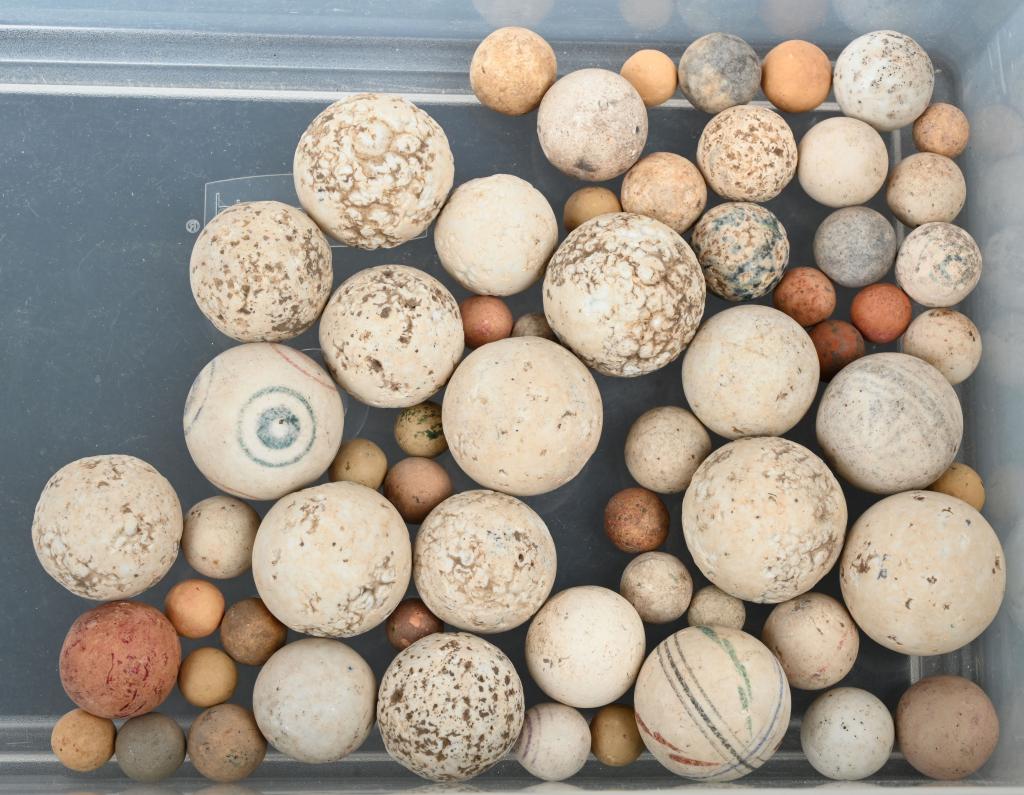 LOT OF CLAY MARBLES: Great lot of original Clay Marbles. Some with decoration. Largest 1 1/2" Conditions vary
