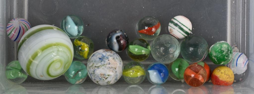 LOT OF MARBLES: Lot of original Marbles. Includes Clambroth, China, Swirls, and more. Largest 1 1/2" Conditions vary