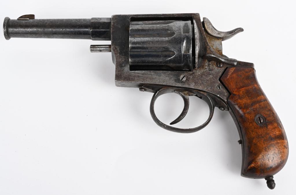 ANTIQUE BELGIAN 8MM LEBEL 9 SHOT REVOLVER: SERIAL NUMBER 6 BARREL 4" CALIBER 8MM LEBEL MANUFACTURED 1880'S. An interesting 9 shot Belgian proofed revolver with swing out cylinder with church steeple fluted cylinder. 2 piece wood grips with bir